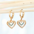 Gold Tone Turquoise-Colored Evil Eye Huggie Drop Earrings in Five Designs view 3