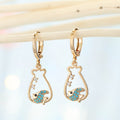 Gold Tone Turquoise-Colored Evil Eye Huggie Drop Earrings in Five Designs view 6
