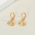 Gold Tone Crystal Evil Eye Pendant Necklace and Huggie Earrings view 3