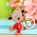 Jeweled Zodiac Cow Keychains in Pink and Red Pictured Colors view 7