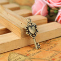 Heart Bow Vintage Key Metal Charm in Three Finishes view 2