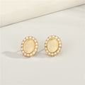 Gold Tone Pearl Oval and Butterfly Stud Earrings in Three Designs view 3