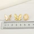 Gold Tone Pearl Oval and Butterfly Stud Earrings in Three Designs view 2