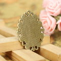Oval Loop Edge Cabochon Trays in Three Metal Finishes view 3