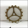 Three-Spoke Gear Metal Charms in Five Finish Options view 6