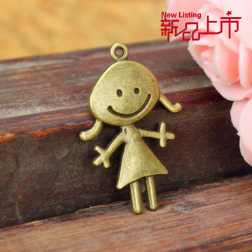 Smiling Girl Figure Metal Charm in Two Antique Finishes