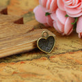 Round Double Heart Medallion Charm in Three Finishes view 3