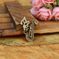Saxophone and Music Note Metal Charms in Three Vintage Finishes view 2
