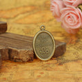 Oval Saint Relief Alloy Medal Charm in 3 Metal Finishes view 3