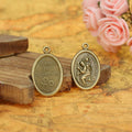 Oval Saint Relief Alloy Medal Charm in 3 Metal Finishes view 1