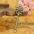 Daisy Bow Long Key Alloy Charm in 3 Metal Finishes view 3