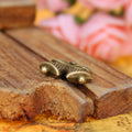 Double Sided Bell Metal Charm in Three Finish Options view 2