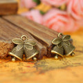 Double Sided Bell Metal Charm in Three Finish Options view 1