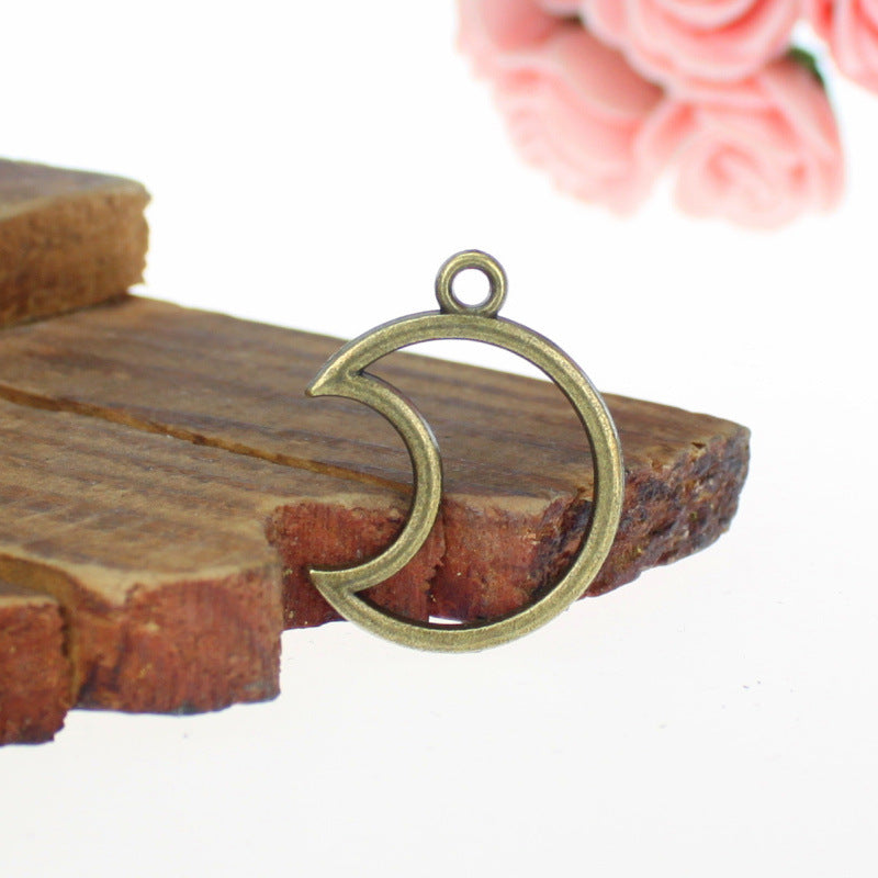 27x21mm Hollow Moon Alloy Charm Pendant
