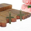 Dotted Border Cross Charm Pendant In Three Finishes For Jewelry Making view 2