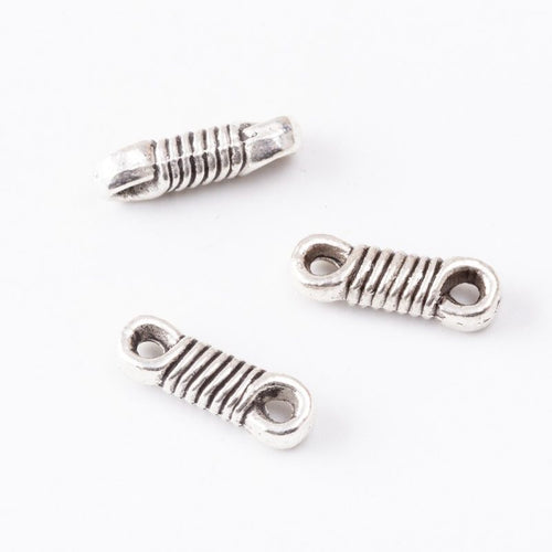 Small Wrapped Coil Double Loop Connector in an antique tone shown from the front