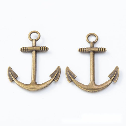 Close view showing the front and reverse details of the plain anchor charm