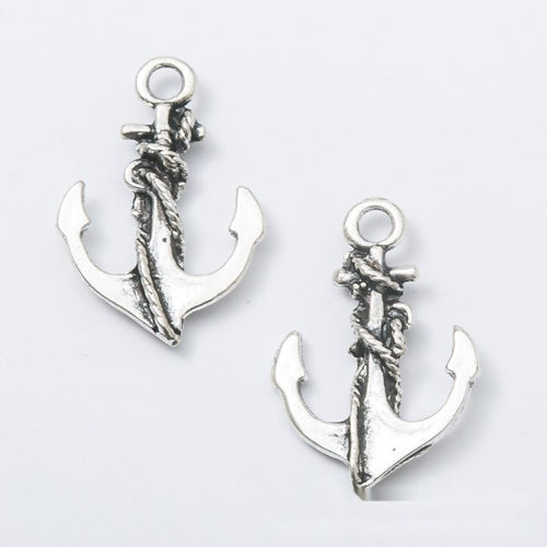 Close product view showing the front and reverse details of the anchor charm