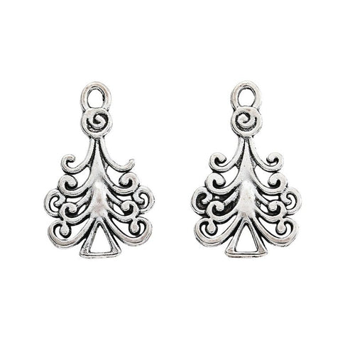 Close-up view of the ornate christmas tree metal charms in antique silver showing its front and reverse metal details.