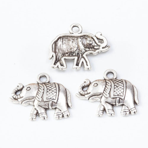 Close view of the walking elephant charm showing its raised front pattern
