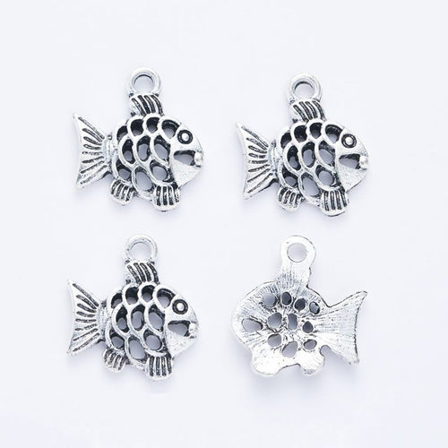 Openwork Floral Fish metal piece showing front-facing surface and relief detail