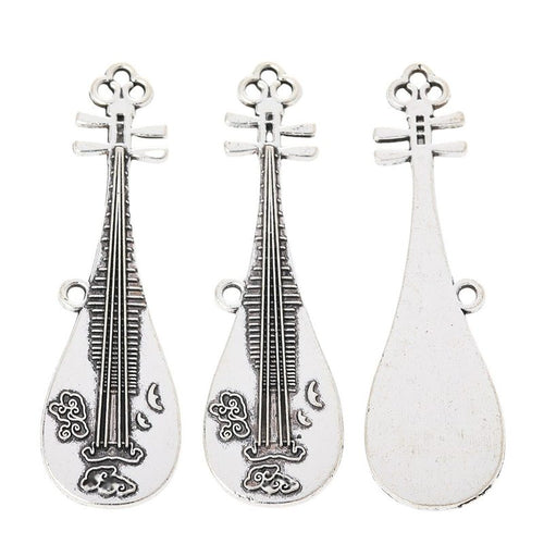 Long pipa lute charm with engraved strings and floral decoration shown in front detail view