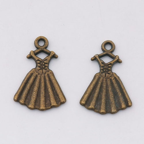 Close view of the pleated dress showing a fitted bodice and flared pleated skirt