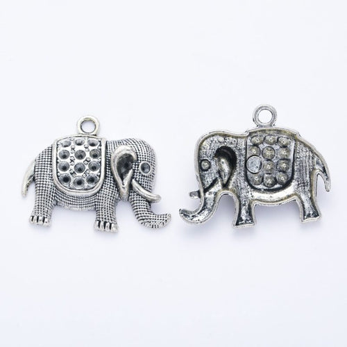 Patterned Elephant metal design front and back view on a light background