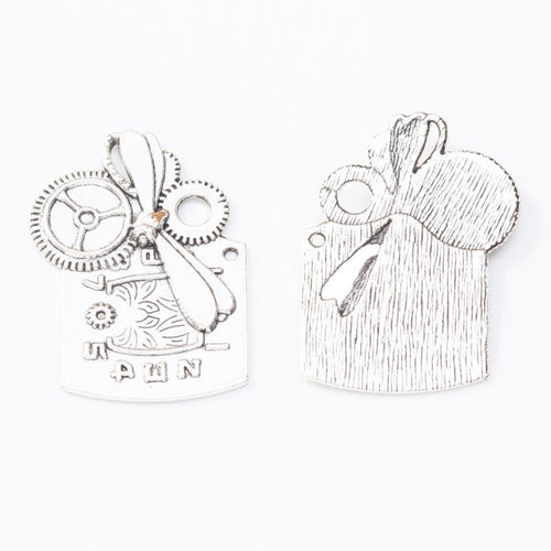 Detailed view of clockwork gears and tools charm metal component