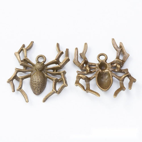 Close view showing the front details of the spider charms