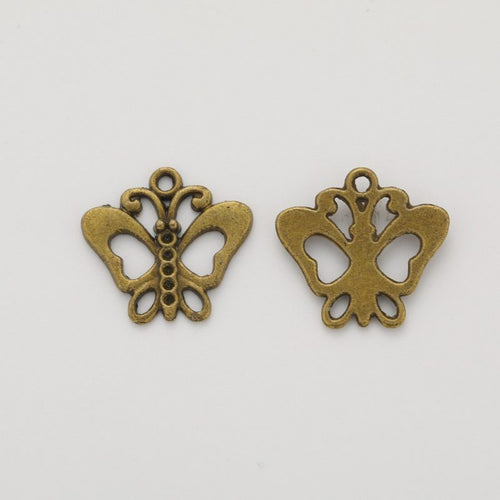 Openwork Butterfly metal design front and back view on a light background