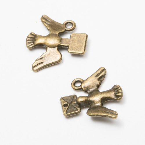 Close view of dove and envelope charm