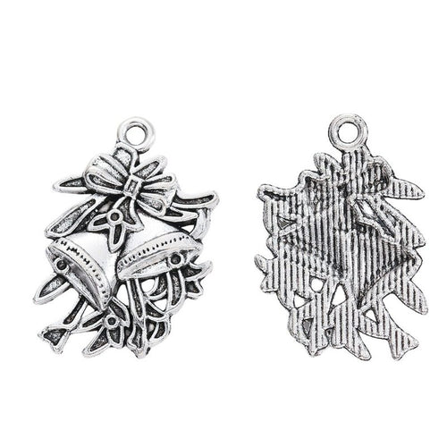 Alternate product view of holly leaves and bells charms on a white background
