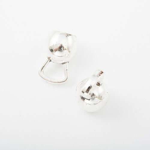 Clear Crystal Barbell Charm Pendant front detail showing a clear faceted ball at each end of a curved metal bar