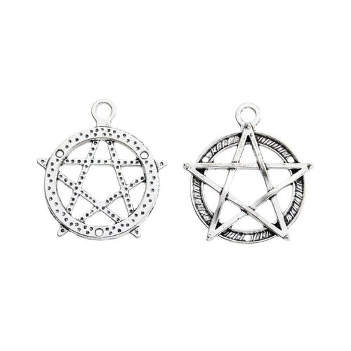 Close view of the circular pentagram charm surface and relief