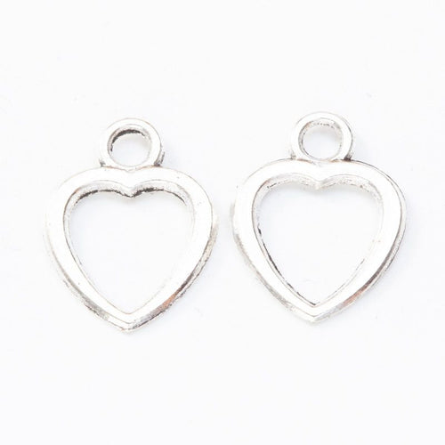 Front and reverse details of open heart charms on a white background