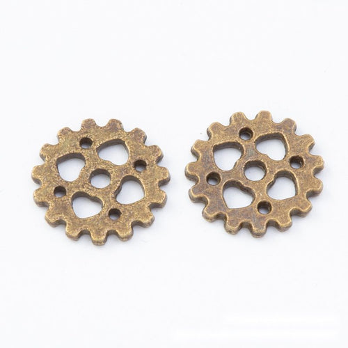 Detail view of small gear embellishment showing finish variation 2