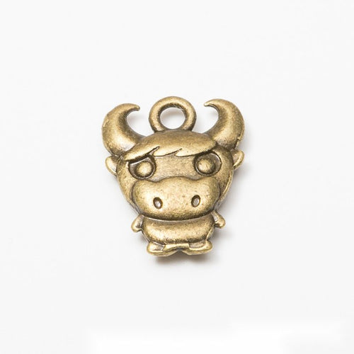 Zodiac animal charm shown in front and reverse details