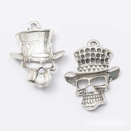 Front and reverse details of the top hat skull metal charm pendant