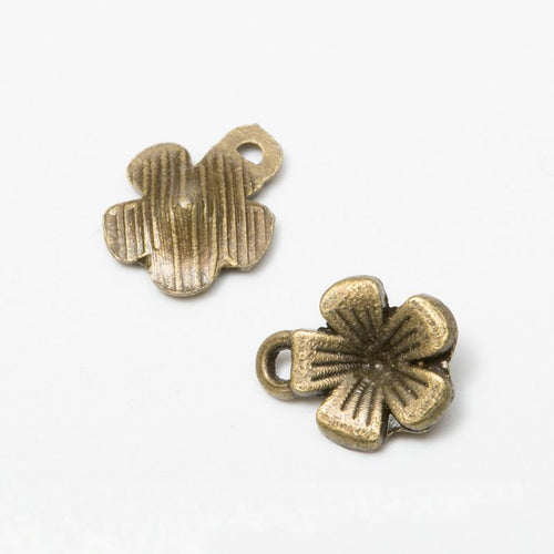 Five Petal Flower Charm Pendant front detail showing five grooved petals and a small top loop