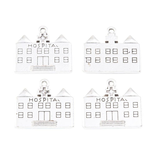 Close view of the hospital building charm showing its raised front pattern