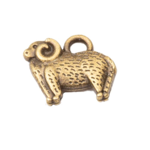 Front detail and finish comparison of the curled horn sheep charm