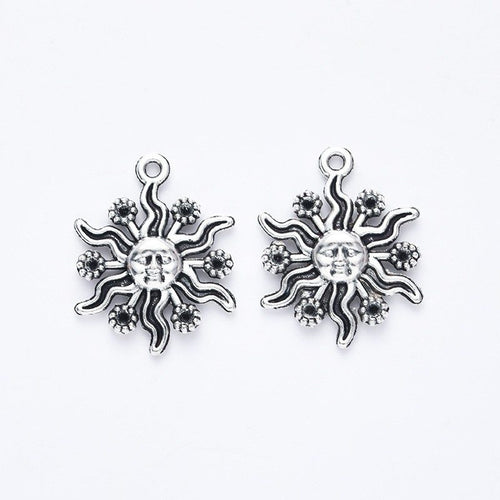 Layered Ray Sun Charm front and reverse details on a white background