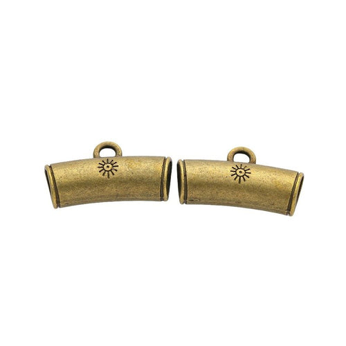 Grouped view of the sun motif curved three way bail bead from the front
