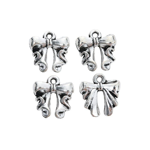 Grouped ornate bow components showing repeated front details and finish