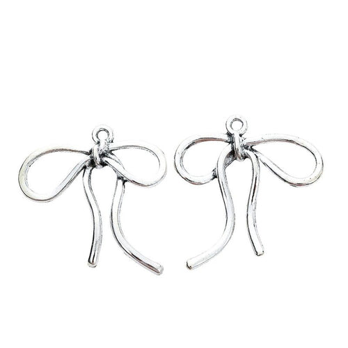 Grouped open loop bow components showing repeated front details and finish