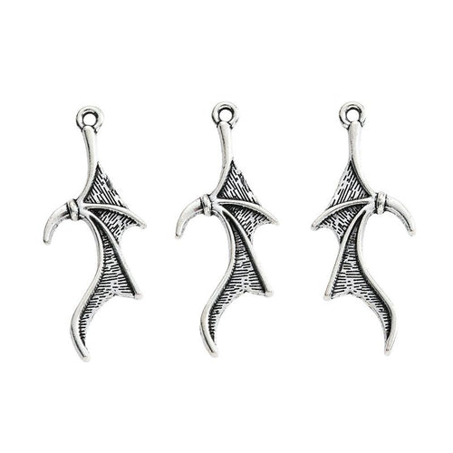Close front and reverse view of the metal long bat-wing charm
