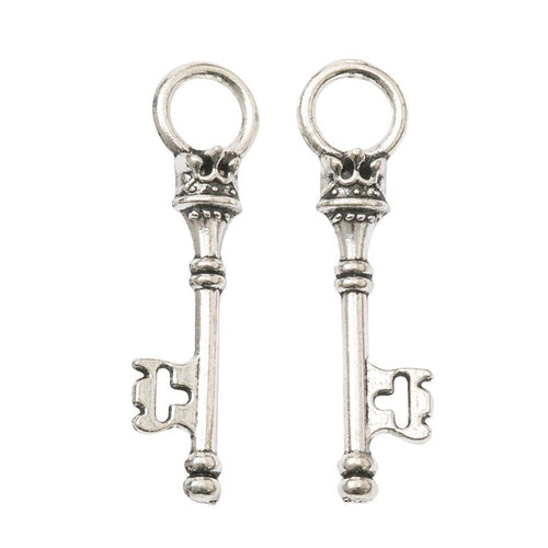 Close view of the a long skeleton-key silhouette with a round decorative bow