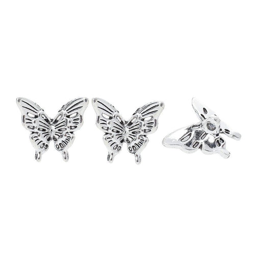 Grouped filigree butterfly components showing repeated front details and finish
