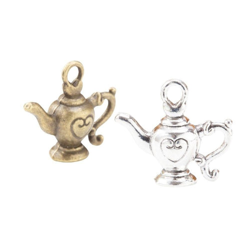 Front and reverse details of heart teapot charms on a white background